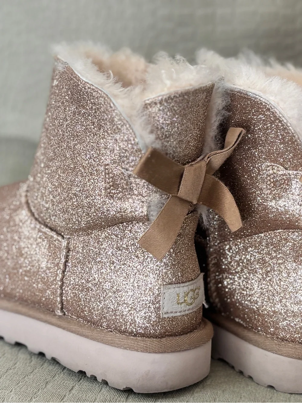 UGG Mini Bailey Bow Glitter Boots Rose Gold